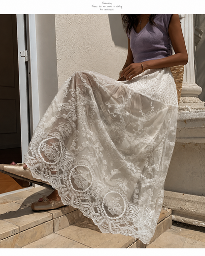 White lace long skirt with lace maxi skirt length, embroidered mesh and scalloped hem.