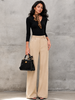 Womens flare trouser with angled pockets and long flare hem for weekday outfits.