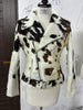 Tricolor cow skin coat for women made from authentic cowhide. This cow print jacket women need for everyday style with edge and comfort.

