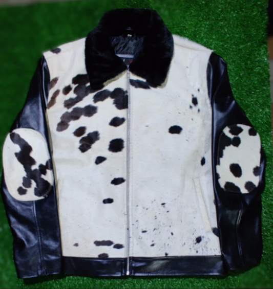 Real cowhide jacket for men featuring unique cow print fur, leather sleeves, and bold elbow patches. A true cow jacket for modern country fashion.

