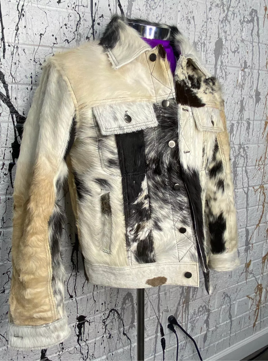 Western cowhide jackets featuring black, tan, and white cow fur. Shop cow print jackets and women cow fur coat styles made from real hide.

