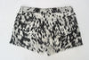 Mini cowhide shorts with black and white cow print for rodeo, country looks, or cowgirl styling. Real cow skin shorts made for bold southern fashion.

