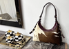 real cowhide handbag in brown and white natural