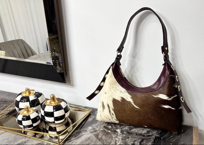 real cowhide handbag in brown and white natural