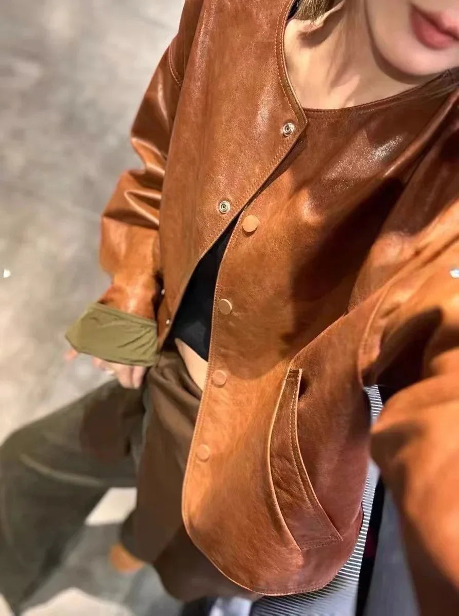 women leather jacket with round neck snap buttons