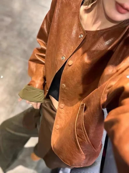women leather jacket with round neck snap buttons