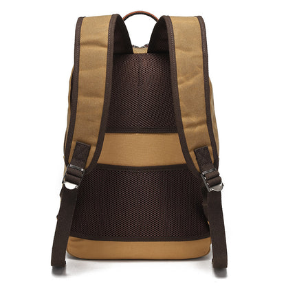 Canvas laptop backpack specification graphic showing 30 cm width, 41 cm height, 11 cm depth, and 15.6 inch compatibility.
