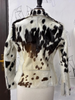 Get noticed in this cow print jacket women swear by. Real cowhide, tricolor tones, and handcrafted details make every jacket one of a kind.

