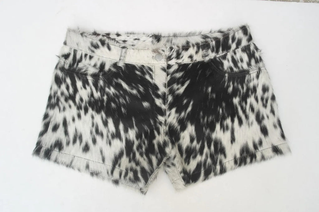 Stand out in real cowhide mini shorts for women. These black and white cow print shorts are perfect for rodeo events, cowgirl outfits, and western styling.

