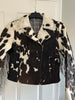 Cow print jacket with real cow hide, structured fit, and full fringe—ideal cowhide jacket women's and men's Western wardrobe essential.

