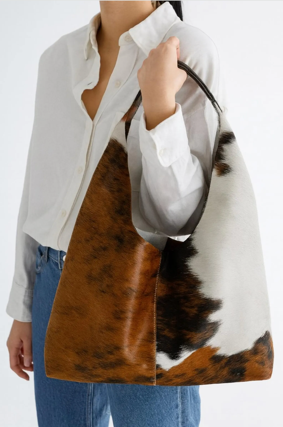 Brown white cowhide shoulder tote bag