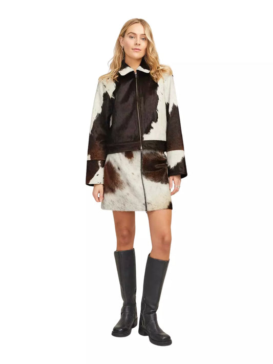 Cowhide jacket and cow skirt outfit made from real cow skin. Bold western set for rodeo events, country festivals, and outdoor gatherings.

