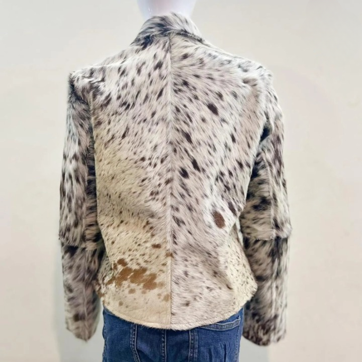 Men’s cowhide leather jacket made from real hide. Each cow jacket offers bold pattern, cow hair texture, and a standout silhouette.

