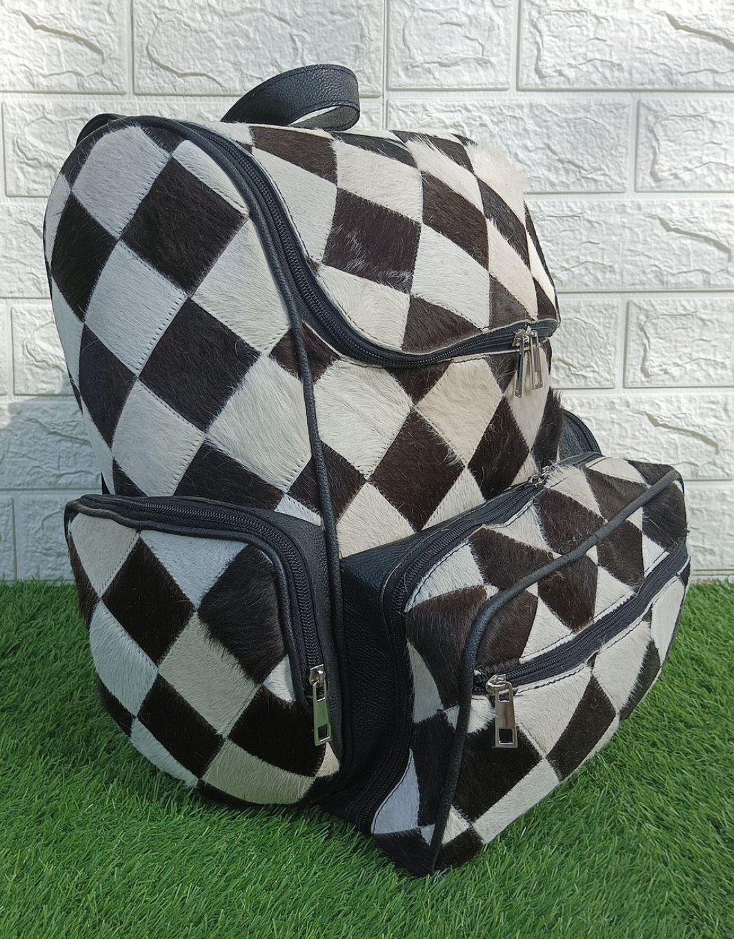 Cowhide patchwork backpack for travel and daily use 4