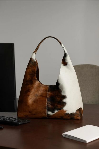 Brown white cowhide shoulder tote bag
