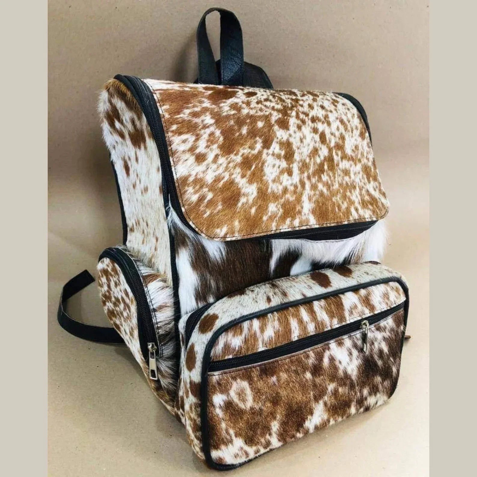 cowhide backpack speckled brown white leather backpack purse