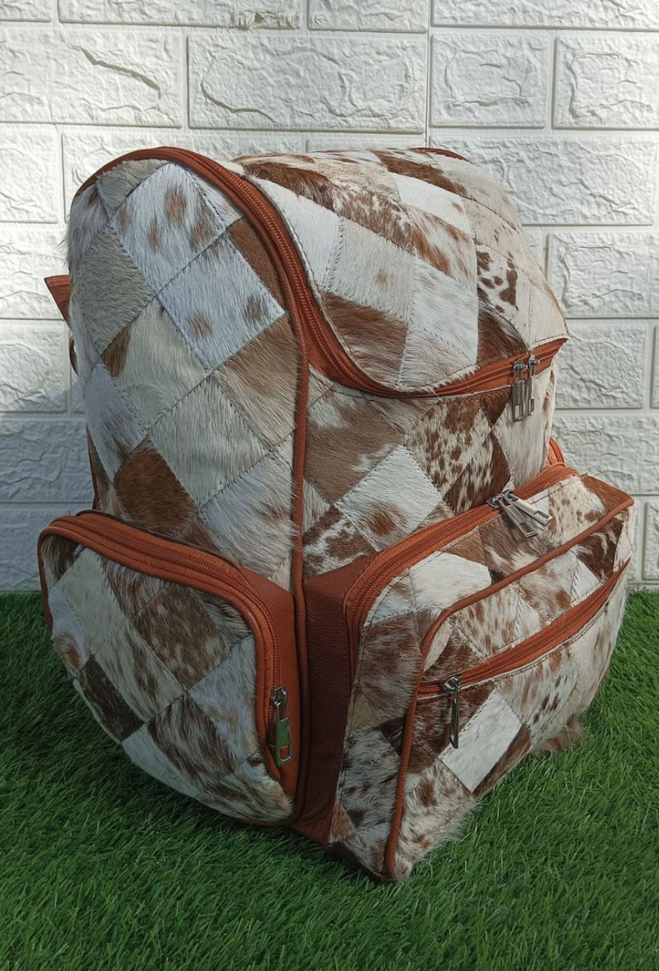 Cowhide patchwork backpack for travel and daily use 1