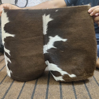 Hair-on-hide lace cowhide shorts for country girls. These cow shorts add rustic attitude to any western outfit with their bold shape and real cow fur texture.

