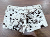 For rodeo nights or western gatherings, these speckled cow hair shorts add the perfect cowgirl feel. Great for horse racing and southern styling.