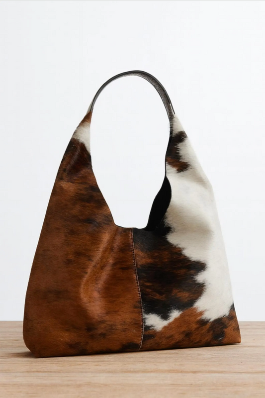 Brown white cowhide shoulder tote bag