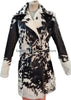 Black and white cowhide jacket for women made from real hair-on-hide leather. Western trench coat design with bold contrast and natural texture.

