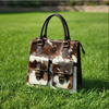 Brown white cowhide pocket tote bag