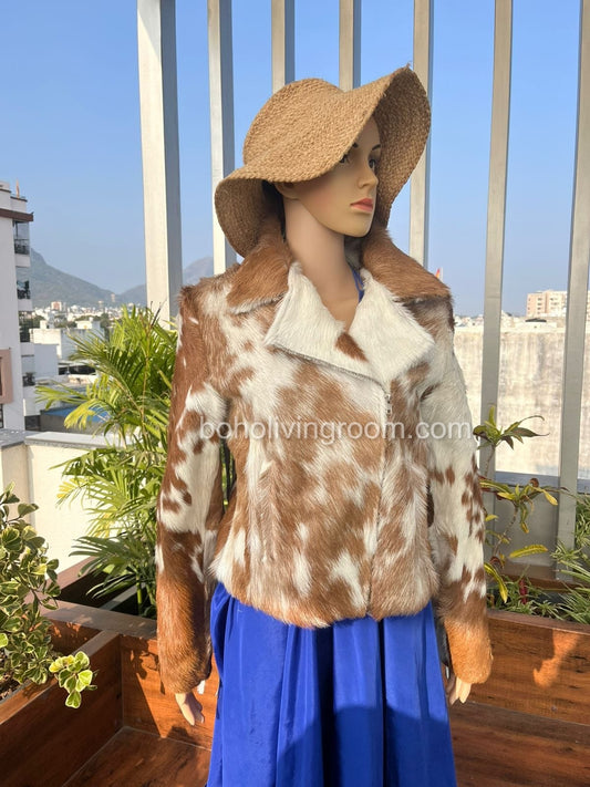 Stand out with a fringe leather jacket made from authentic cowhide fur. Perfect as a cow print jacket womens love for casual, country, or streetwear outfits.

