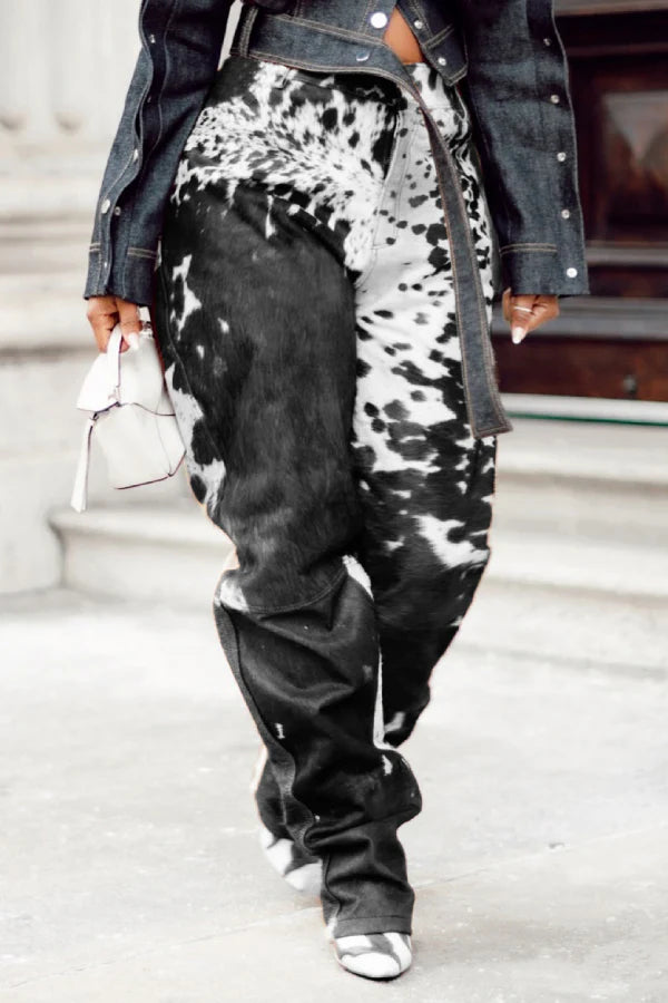 Turn heads with black and white cowhide pants for women. Real cow skin design for rodeo nights, western fashion, and southern lifestyle outfits.
