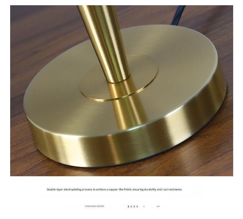 Modern Scandinavian brass table lamp with linen shade