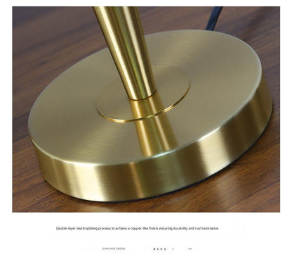 Modern Scandinavian brass table lamp with linen shade