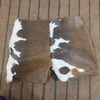 Women’s front lace cowhide leather shorts in natural hide tone. Designed for rodeo themes, cowgirl outfits, and western-inspired country celebrations.

