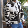 Cowhide jackets built with natural hair-on cow leather and brown button details. Great for rodeo events, countryside travels, and casual city use.

