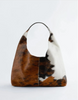 Brown white cowhide shoulder tote bag