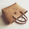 Natural rattan bag crafted from Purun grass. This handwoven summer tote fits your daily essentials in lightweight style.


