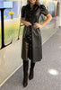 women buttoned long leather dress