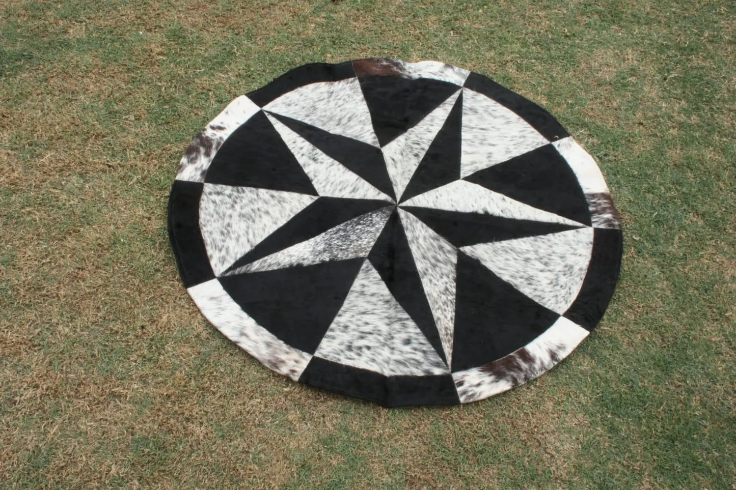 round patchwork cowhide rug