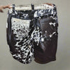 Shop black and white cowhide shorts for men with real cow fur. Great for rodeo events, southern wear, and western cowboy looks.

