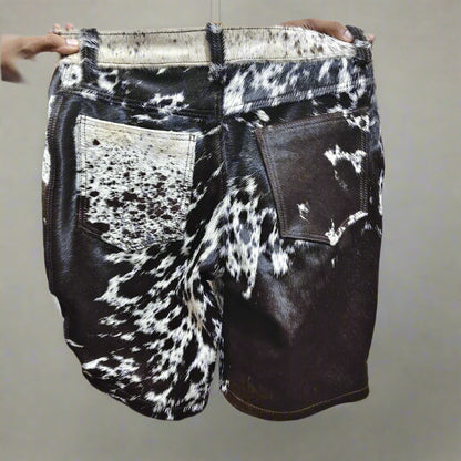 Shop black and white cowhide shorts for men with real cow fur. Great for rodeo events, southern wear, and western cowboy looks.

