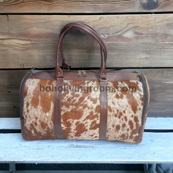 Head-Turning Cowhide Duffel: Unique & Multipurpose. Ditch the boring gym bag. Carry clothes, gear, & adventure in style. Crafted just for you.