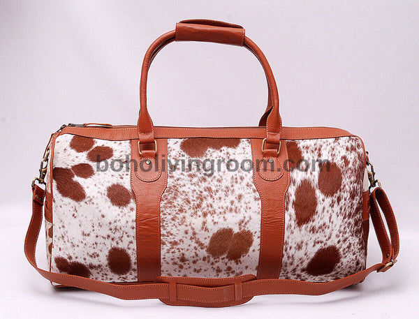 Discover the essence of wanderlust with this cow skin weekender bag, tailored for the modern nomad."