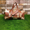 Make a bold statement with this cowhide overnight bag, a symbol of luxury and practicality for the discerning traveler.