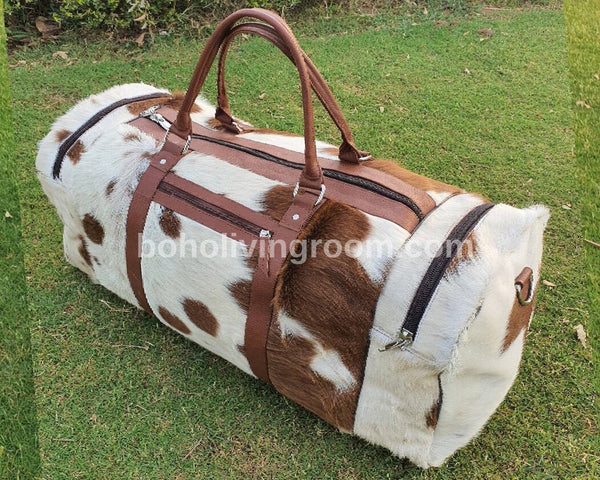Travel in elegance with a timeless cow fur overnight bag, your essential companion for luxurious journeys.