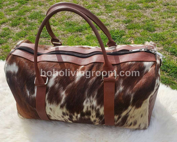 Make every journey unforgettable with this cowhide overnight bag, a testament to your refined taste.