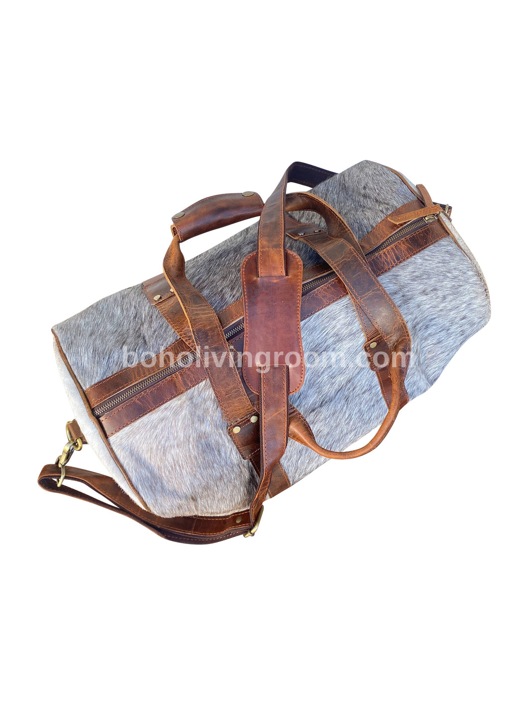 Forge new paths with this cowhide duffle bag, your trusted companion for all your journeys near and far.