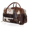 Elevate your gym routine with this cow skin gym bag, designed for active individuals.