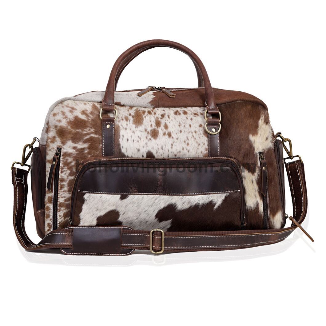 Unwind in elegance with this cowhide duffle bag, your perfect travel companion.