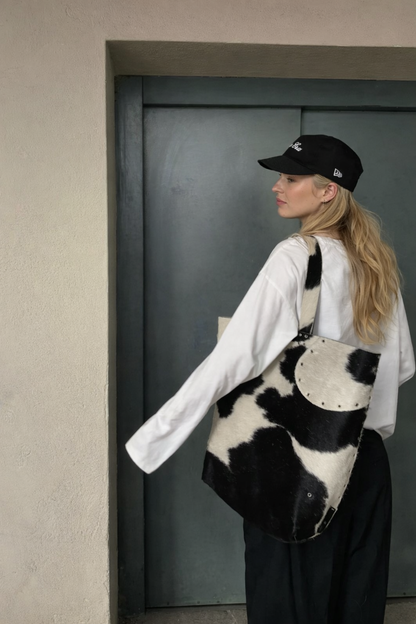 Large black white cowhide tote bag