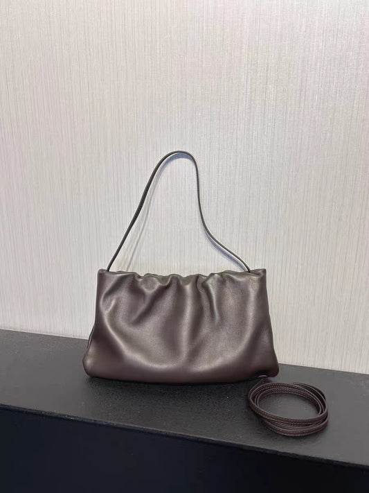 Women ruched leather dumpling bag made from top-grain sheepskin with zipper opening and soft cloud clutch structure