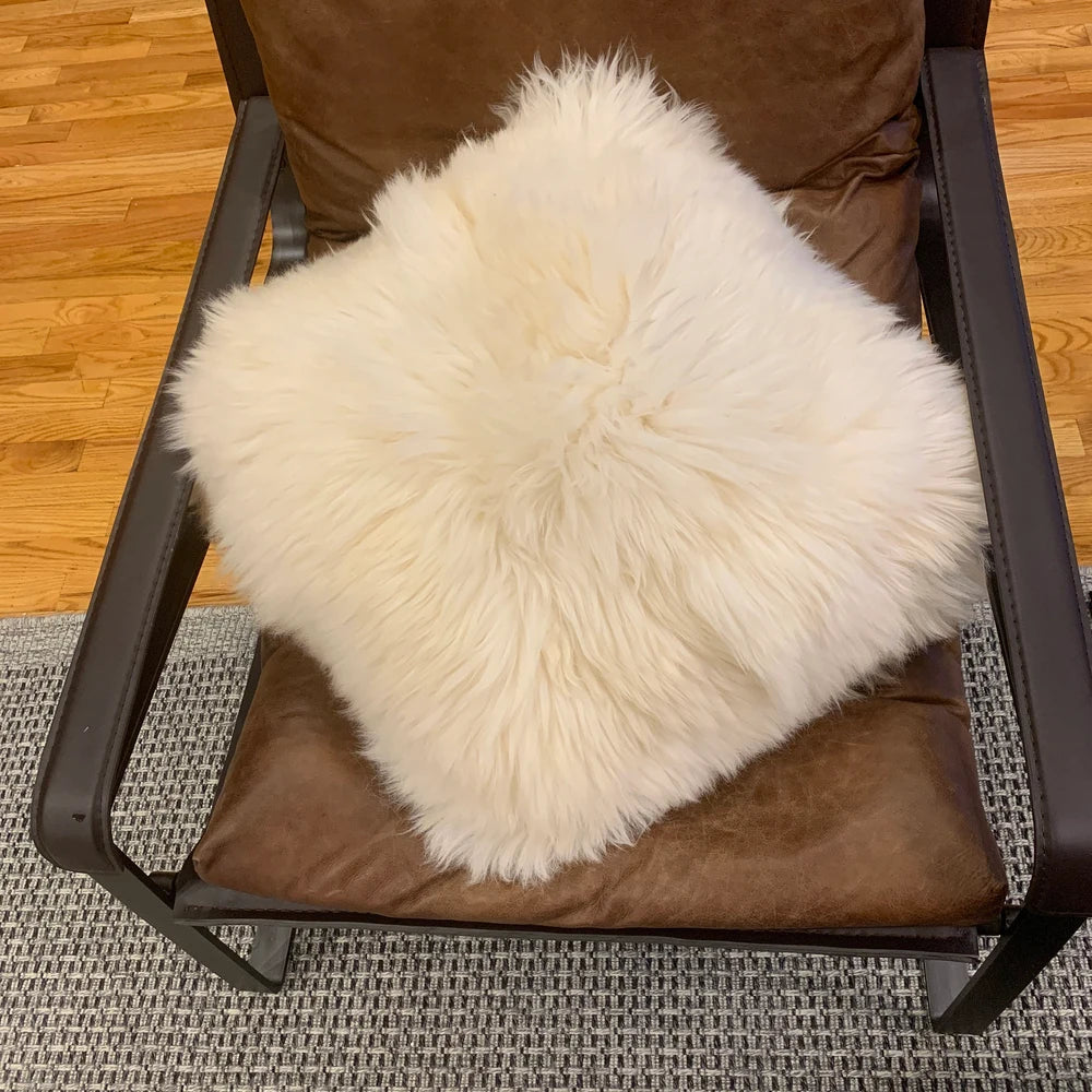 white natural sheepskin pillow