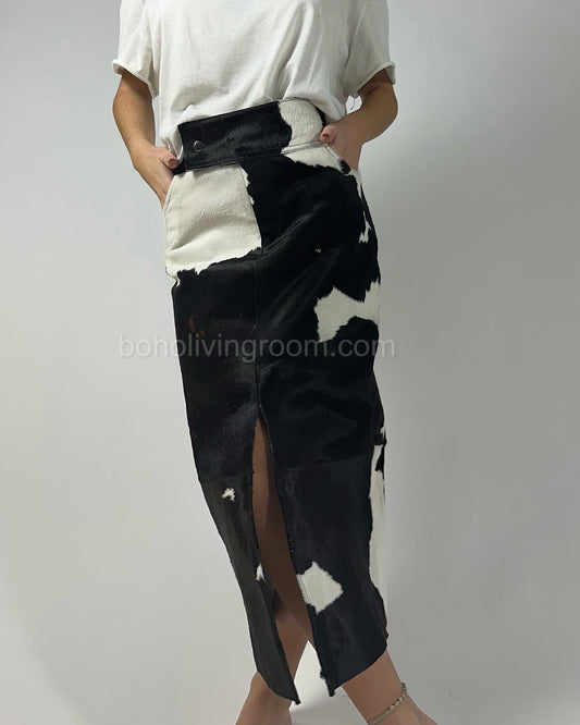 Stand out with a mid length midi cowhide skirt featuring genuine cowhide and a unique pattern. Perfect for creating statement cowhide skirt outfits.


